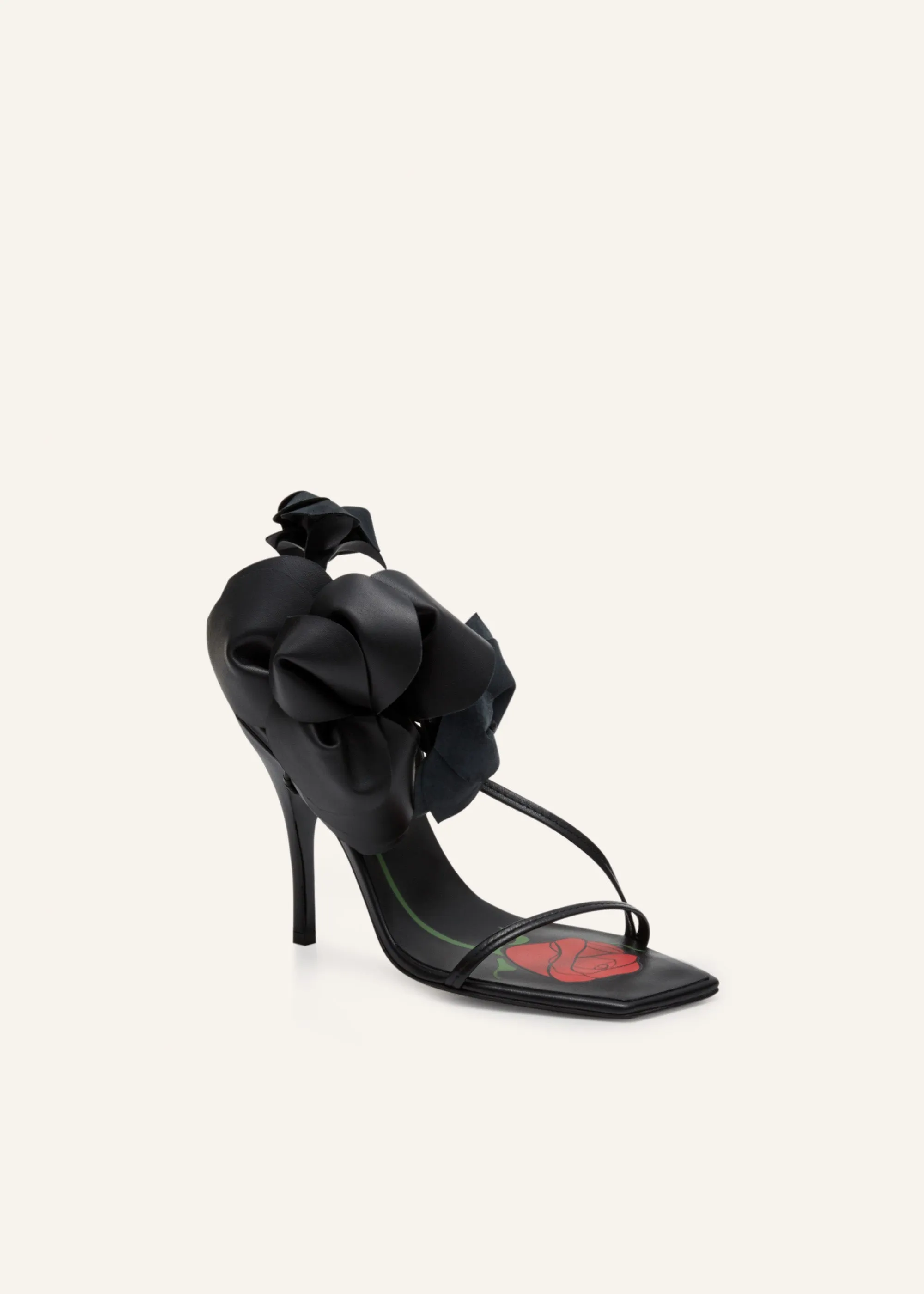 Rose appliqué leather sandals in black